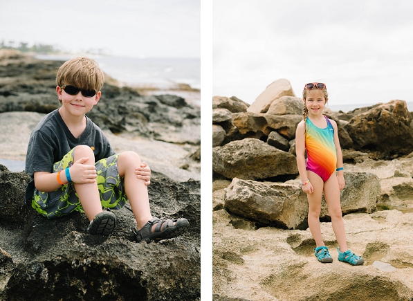 Boy and Girl sitting on the tide pools in Ko Olina