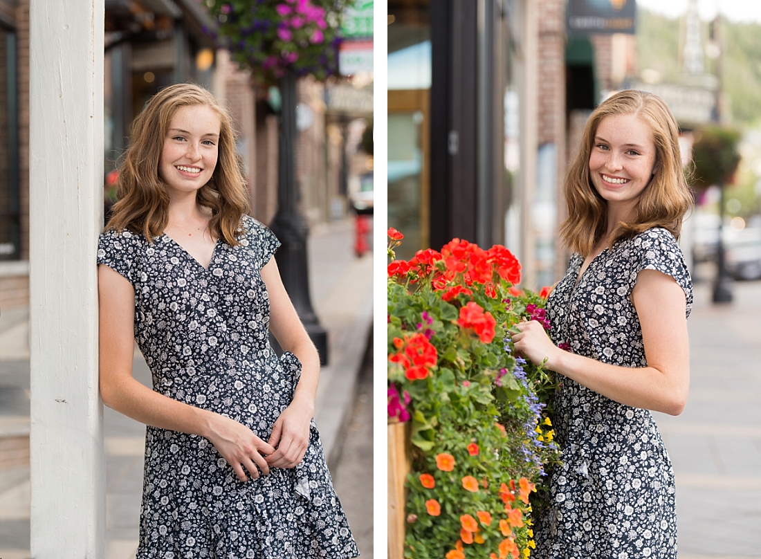 Utah Senior Portraits on Park City Main Street, girl standing by geranium flowers