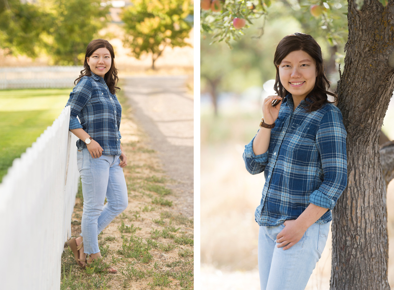 utah senior portraits of girl in blue plaid shirt leaning against white picket fence