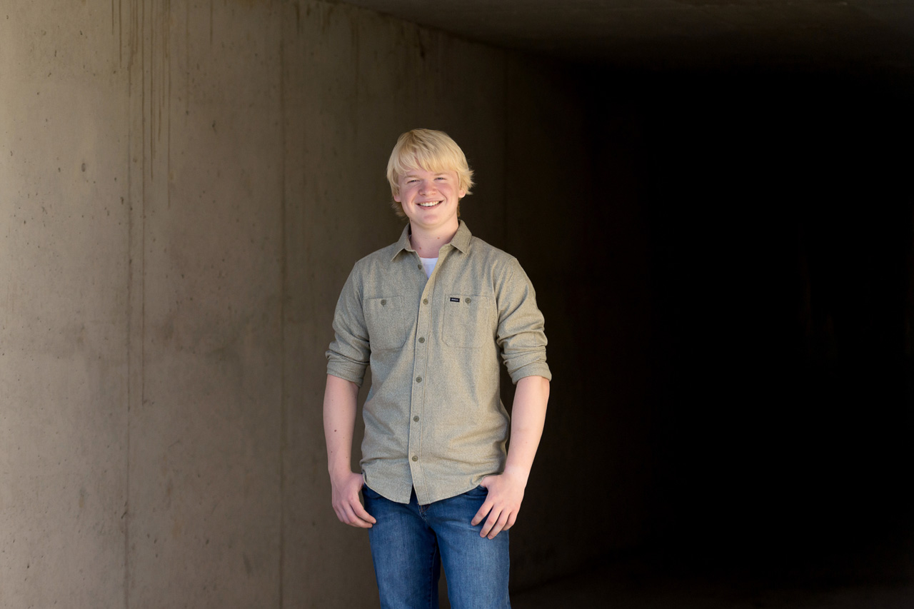 Waterford School senior portraits in a cement tunnel.