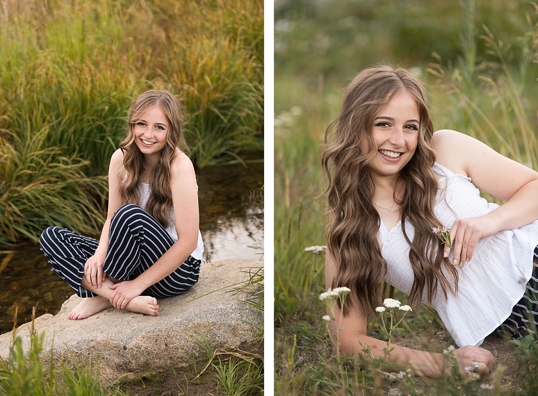 Utah Senior Portraits of girl sitting on a rock near a creek with wildflowers