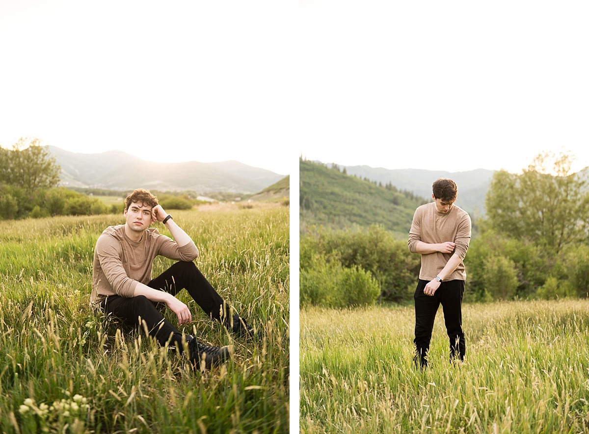 Boy in a field in park city with mountains in the background